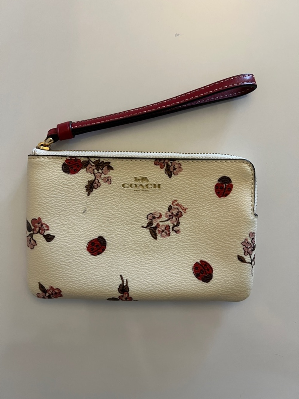Coach Corner Zip Wristlet With Ladybug 🐞 Floral Print Limited Edition